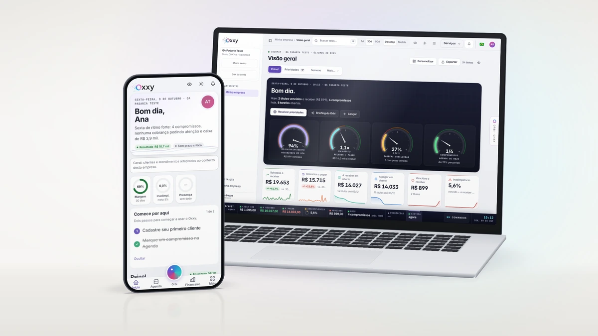 Notebook e celular com a Oxxy aberta, com dados de exemplo: a Visão geral no computador e o Início no celular.